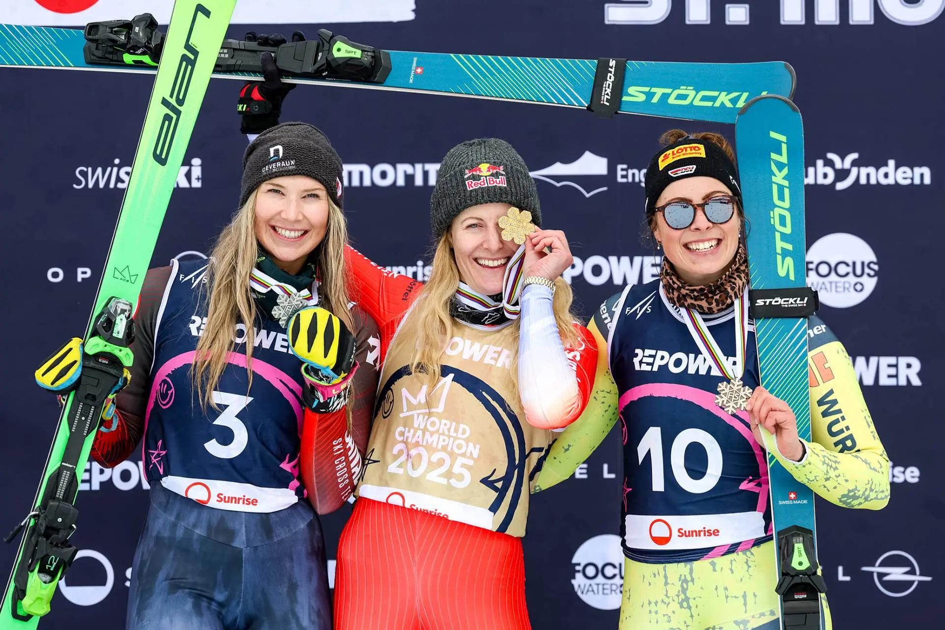 Three female winner pose with their medals