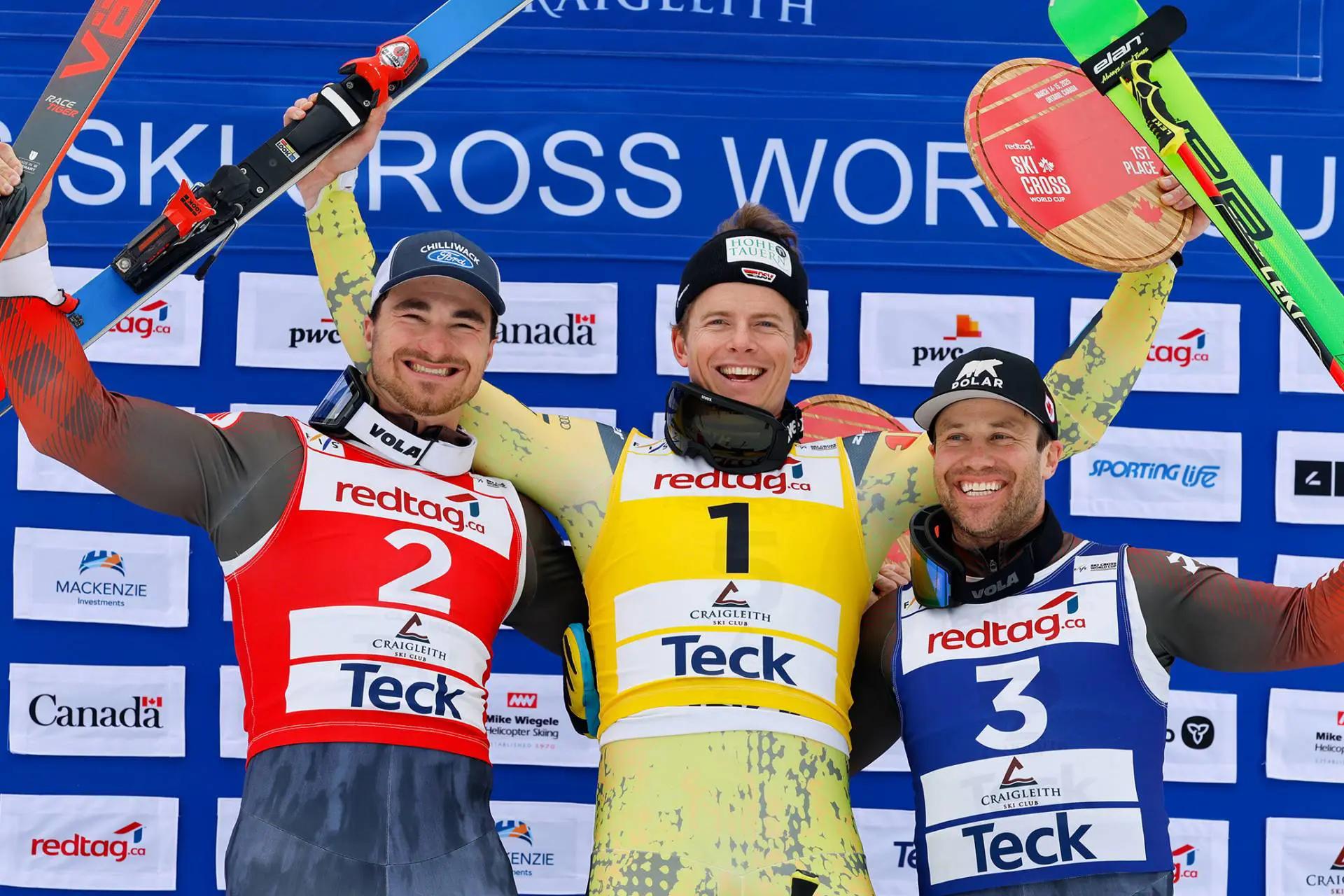 3 podium mens winners smiling together