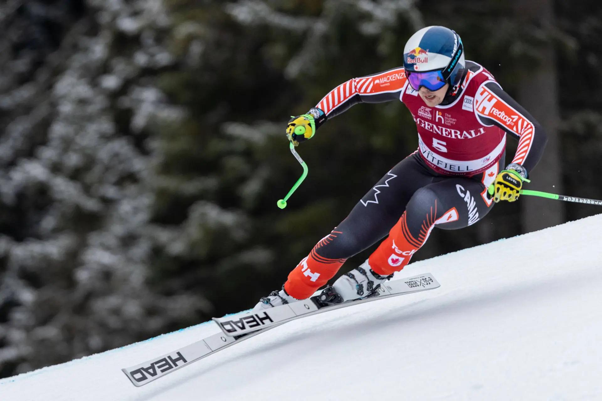 An action shot of James Crawford at speed racing down the slope