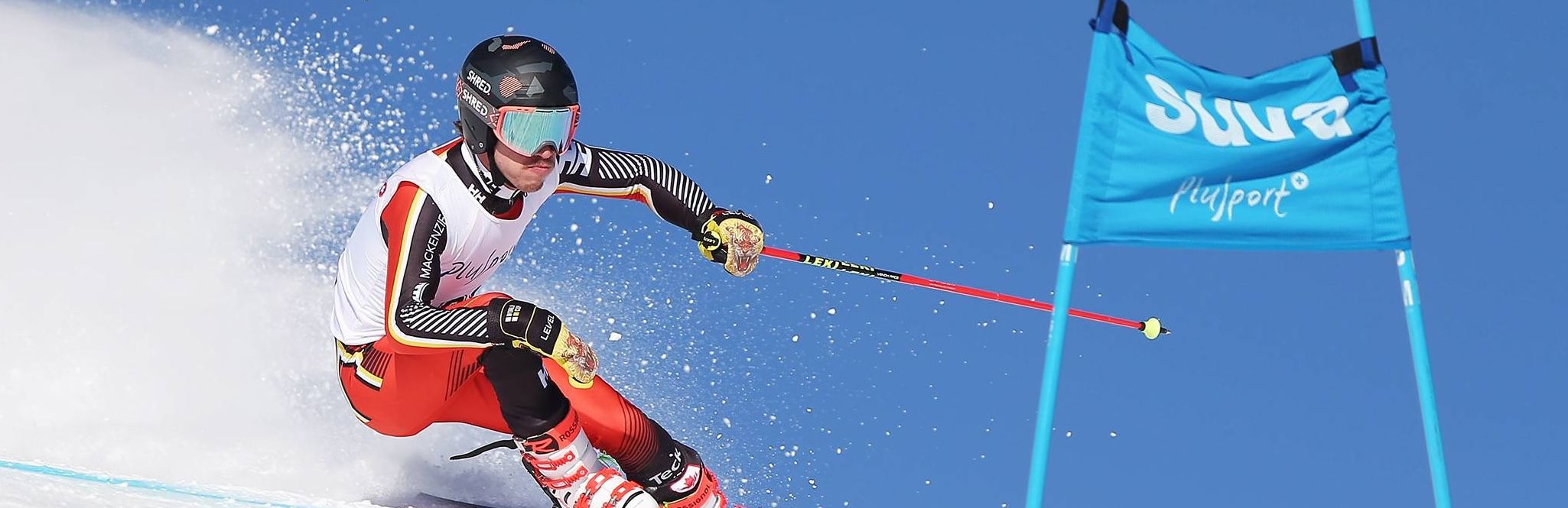 Action Shot of Alpine athlete skiing in a race