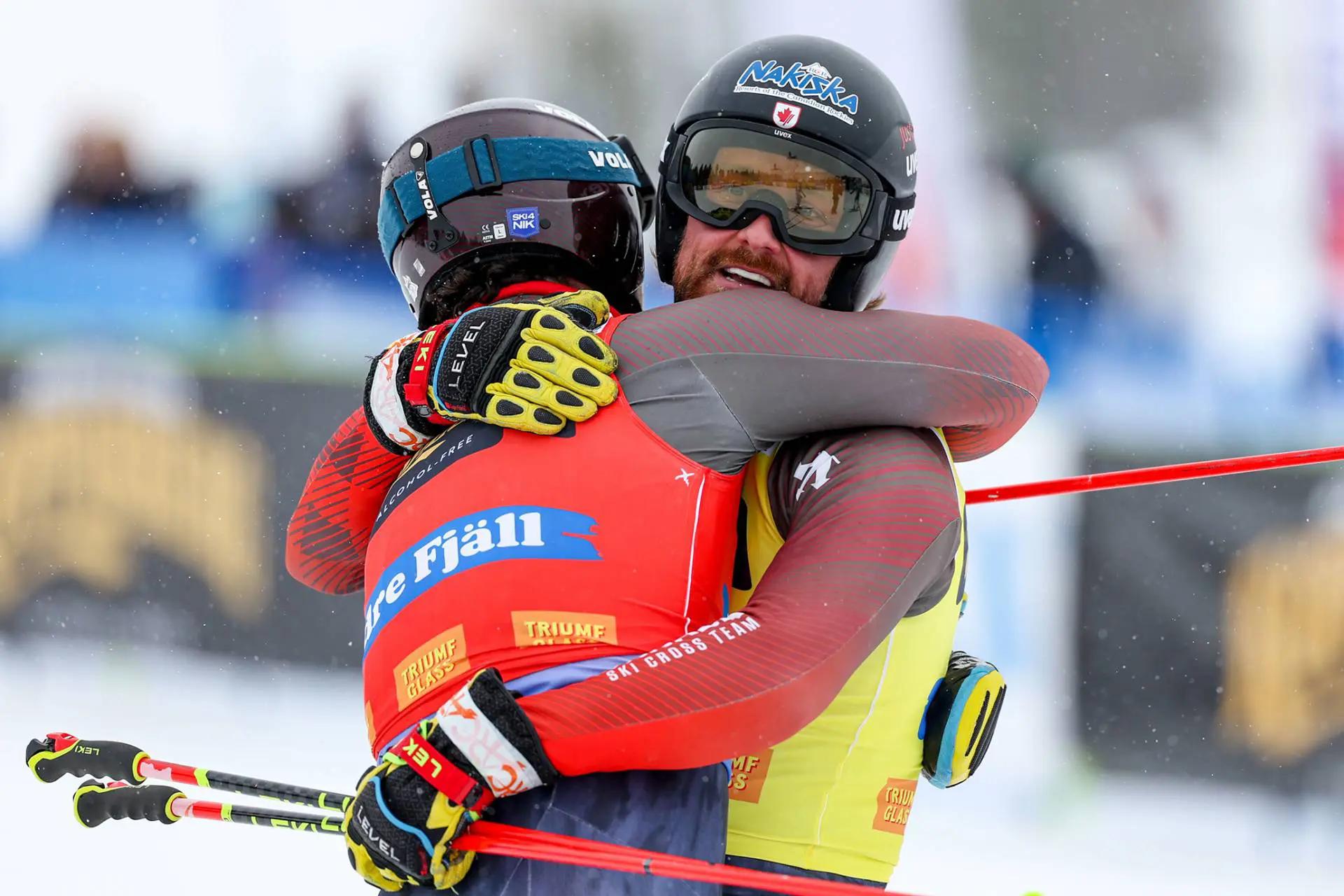 Reece Howden hugging another skier