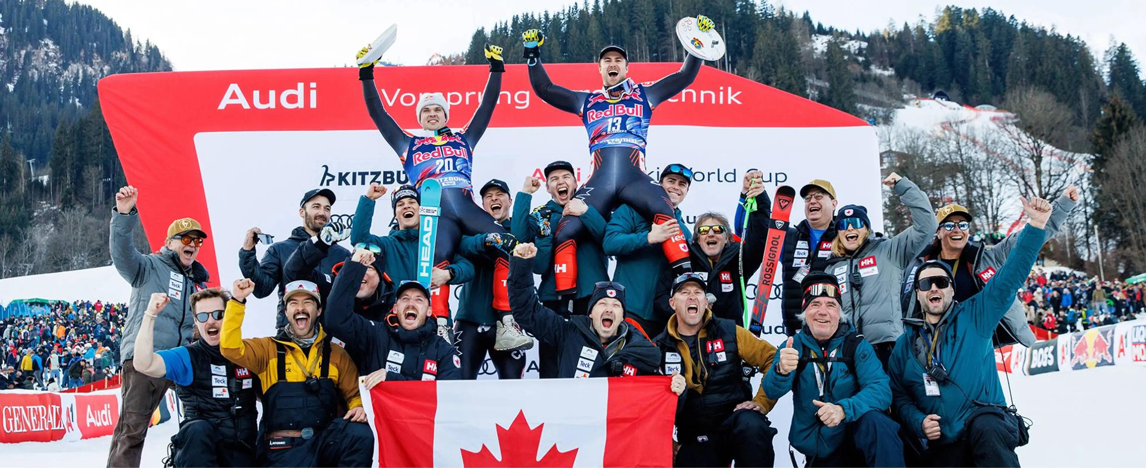 Skii athletes celebrating their medals.